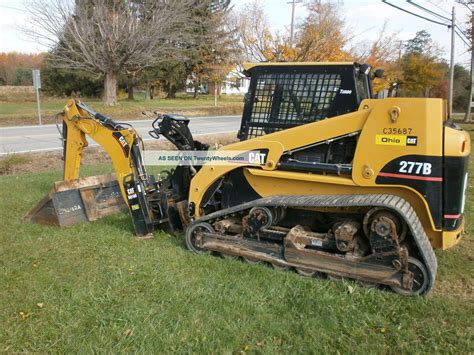 caterpillar skid steer quick attach|caterpillar wheel loader attachments.